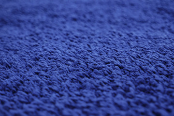 Close-up of blue artificial fabric texture