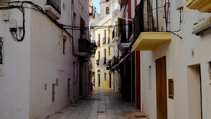 Fototapeta na wymiar narrow street in ibiza spain