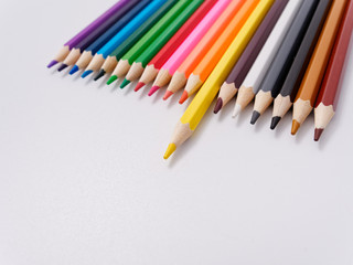 colored pencils sharpened on a white background.