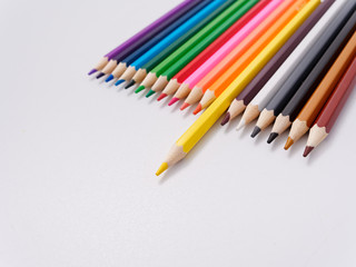 colored pencils sharpened on a white background.