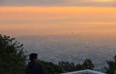City view, orange light in the morning with fog
