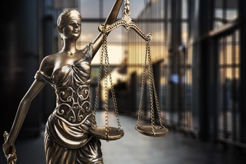 Law scales on table, close-up view