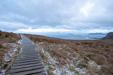 Trail in Norway on Runde, sea and fjell in background