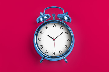 Blue Alarm Clock - Time Concept with word Work and red background