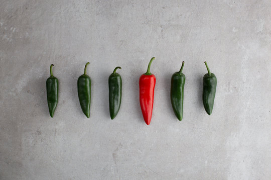 Green and red chillies in line be different