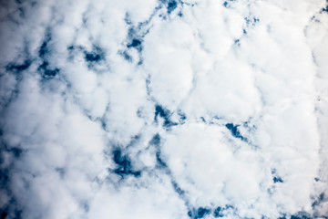 Sky full of clouds close up shot for wall paper and graphic designing purposes.