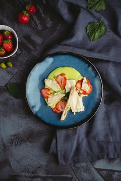 Overhead view of strawberry dessert served on plate