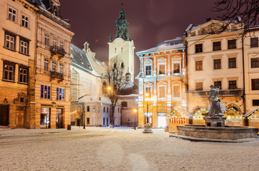  Lviv street in winter - obrazy, fototapety, plakaty