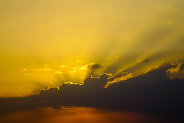 Sunset sky with lighted clouds