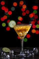 Glass of cocktail with illuminate night light