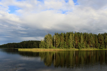 Fototapeta na wymiar Beautiful landscape of forest lake in Lithuania.
