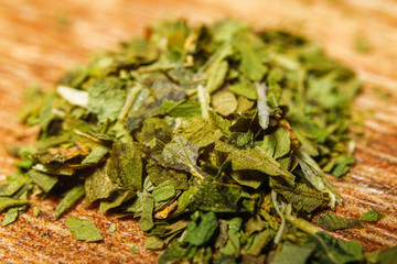 Extreme macro photography of dried grinded parsley spice