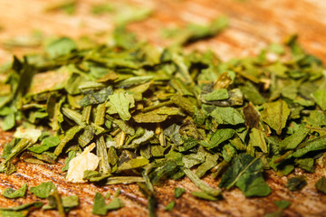 Extreme macro photography of dried grinded parsley spice