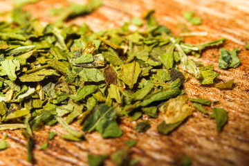 Extreme macro photography of dried grinded parsley spice
