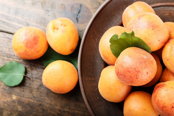 ripe apricots in a plate