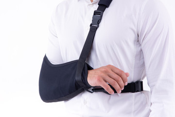broken hand wearing an arm brace