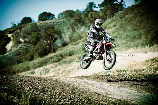 Motorbike racer in the air.