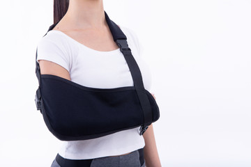 broken hand wearing an arm brace