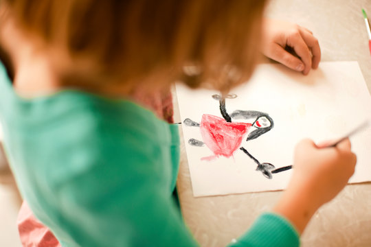 Girl drawing a picture.