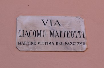 Italy: Road signal (Giacomo Matteotti street, martyr and victim of fascism.