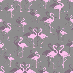 Pink flamingos. Zoo bird park. Seamless pattern. Overlap exotic wading birds.  Flamboyance flock on gray bird park. Walking flamingos. 