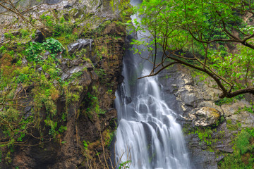 Khlong Lan Waterfall, the beautiful waterfall in deep forest at Khlong Lan National Park ,Kamphaeng Phet, Thailand,