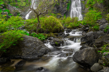 Khlong Lan Waterfall, the beautiful waterfall in deep forest at Khlong Lan National Park ,Kamphaeng Phet, Thailand