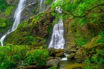 Khlong Lan Waterfall, the beautiful waterfall in deep forest at Khlong Lan National Park ,Kamphaeng Phet, Thailand,