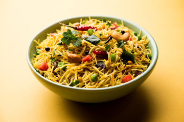 Spicy semiya uppma or upma served in plate. selective focus