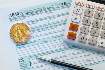 New IRS 1040 tax form used to calculate capital gain or loss for bitcoin trading