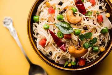 Spicy semiya uppma or upma served in plate. selective focus