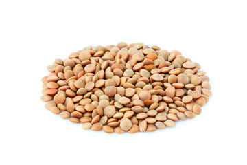 Stack of uncooked lentils isolated.
