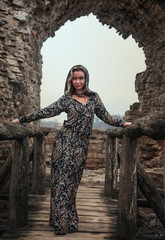 Girl on ancient ruins