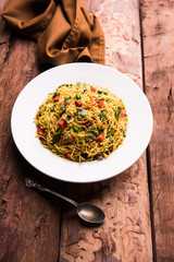 Spicy semiya uppma or upma served in plate. selective focus