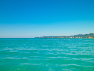 Fototapeta premium Blue water of Tyrrhenian sea in Vada, Tuscany, Italy.