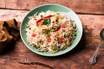 Spicy semiya uppma or upma served in plate. selective focus