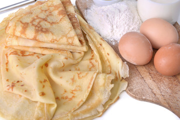 Obraz na płótnie Canvas homemade french pancake with eggs, flour and milk