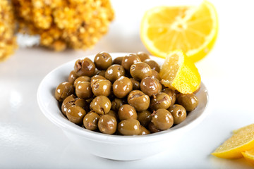 Green olives on white background. Green olives from Antakya, Turkey.