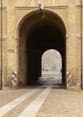 Parma, Italy. Street view through the arch in the Old town