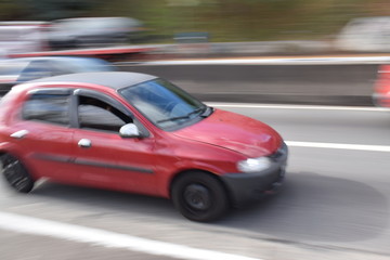 Fototapeta na wymiar red car on the road