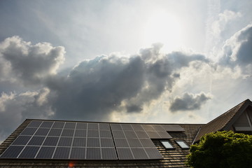 Fototapeta premium Solar panels on roof of house in Germany