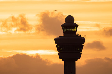 Airport control tower sunset plane - obrazy, fototapety, plakaty