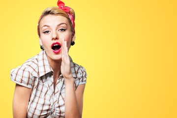 Beautiful woman on yellow background.