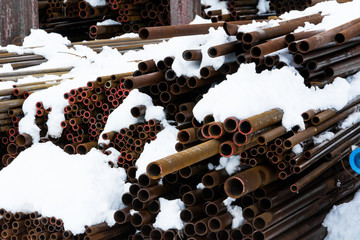 Metal rolling. A round tube different diameter are stacked in storage for sale and loading in stock...