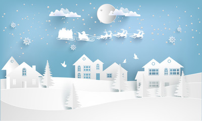 Fototapeta na wymiar santa claus with a deer flying over houses on a snowy hill. winter design of paper and craft art