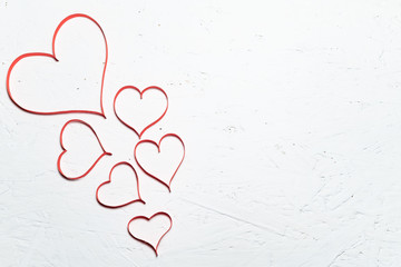Red paper hearts. A gift for a loved one on Valentine's day.
