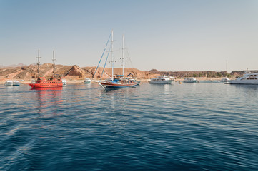 Obraz premium Sinai mountains and picturesque landscapes of the red sea in Egypt. Boat trip on the red sea