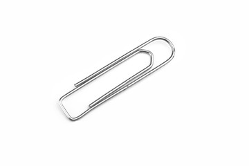 Old steel paper clip isolated on white background
