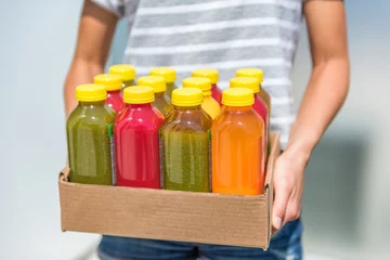 Printed kitchen splashbacks Juice Bottles of juice with fruits and vegetables in delivery box. Cold pressed juicing bottles. Healthy juices for detox.