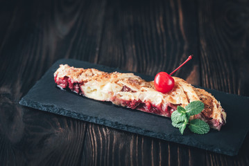 Portion of cherry custard pie